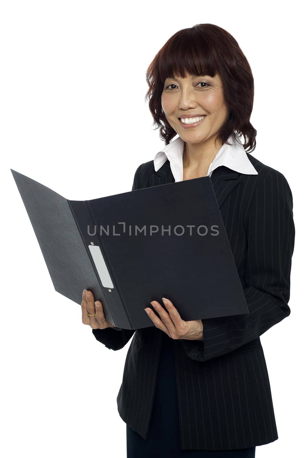 Secretary holding opened binder, smiling. Isolated against white background
