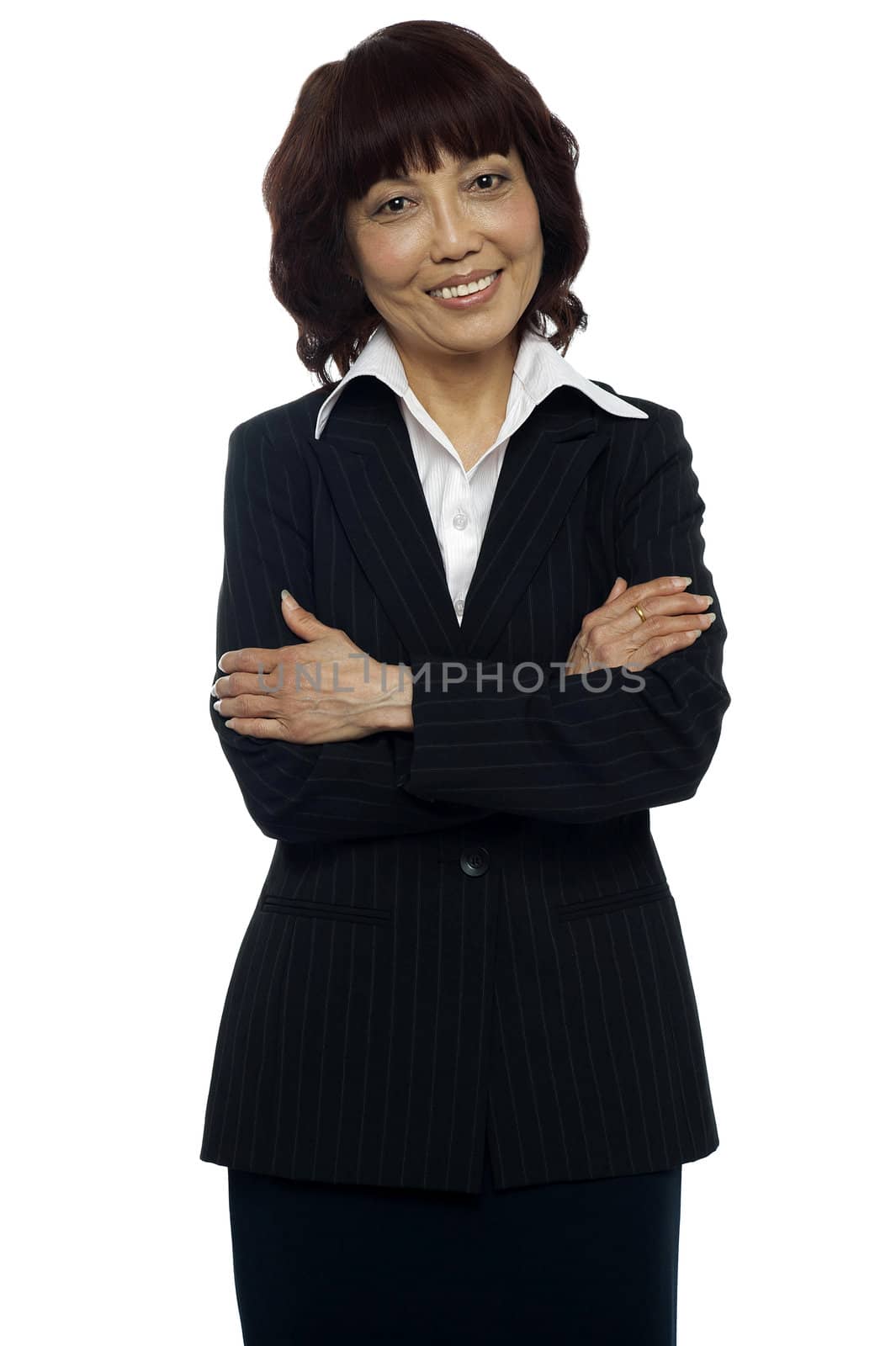 Isolated Business manager posing with her arms crossed against white background