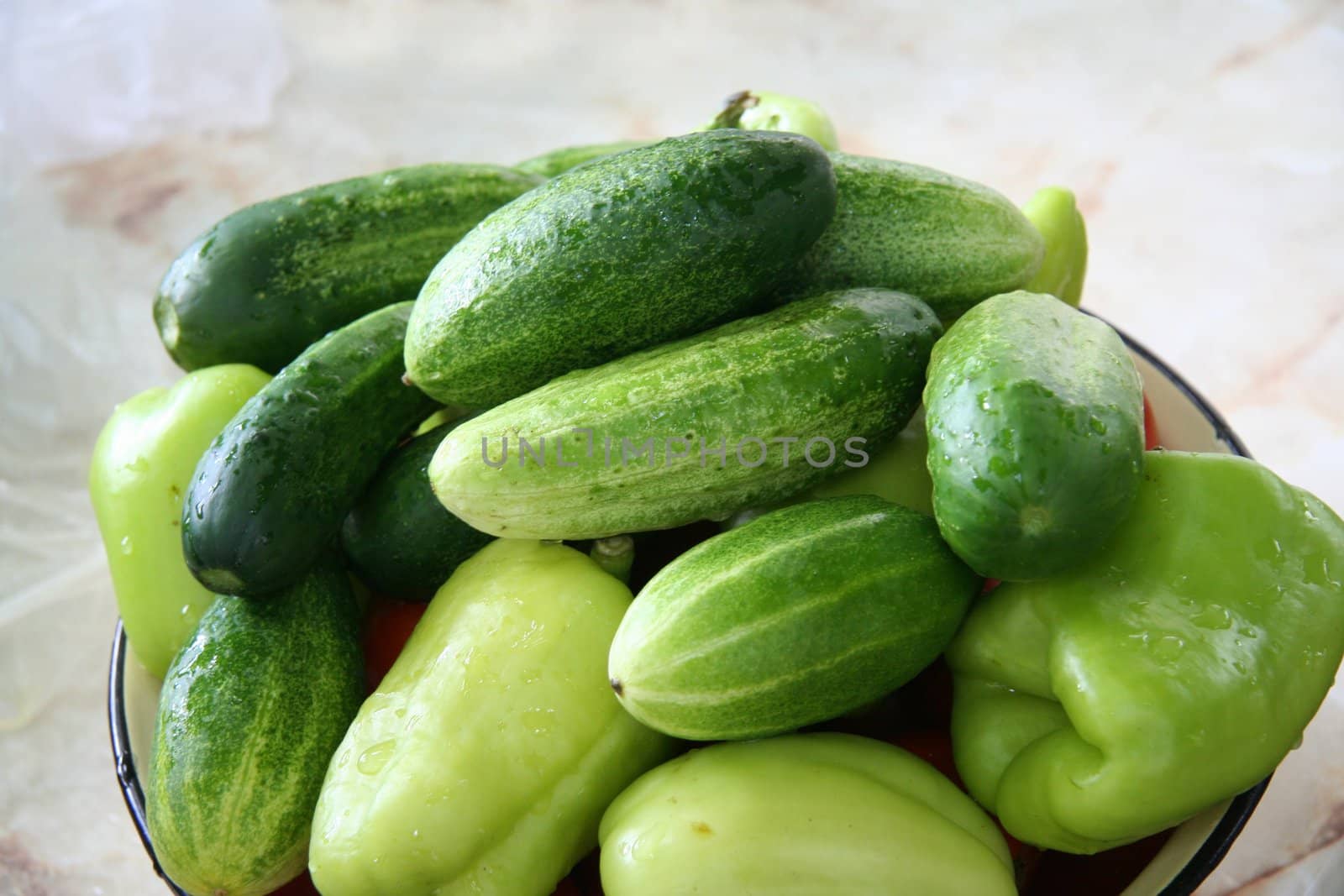 Fresh salted cucumbers with green pepper