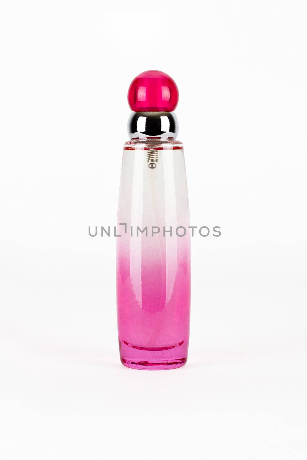 Pink parfume bottle isolated