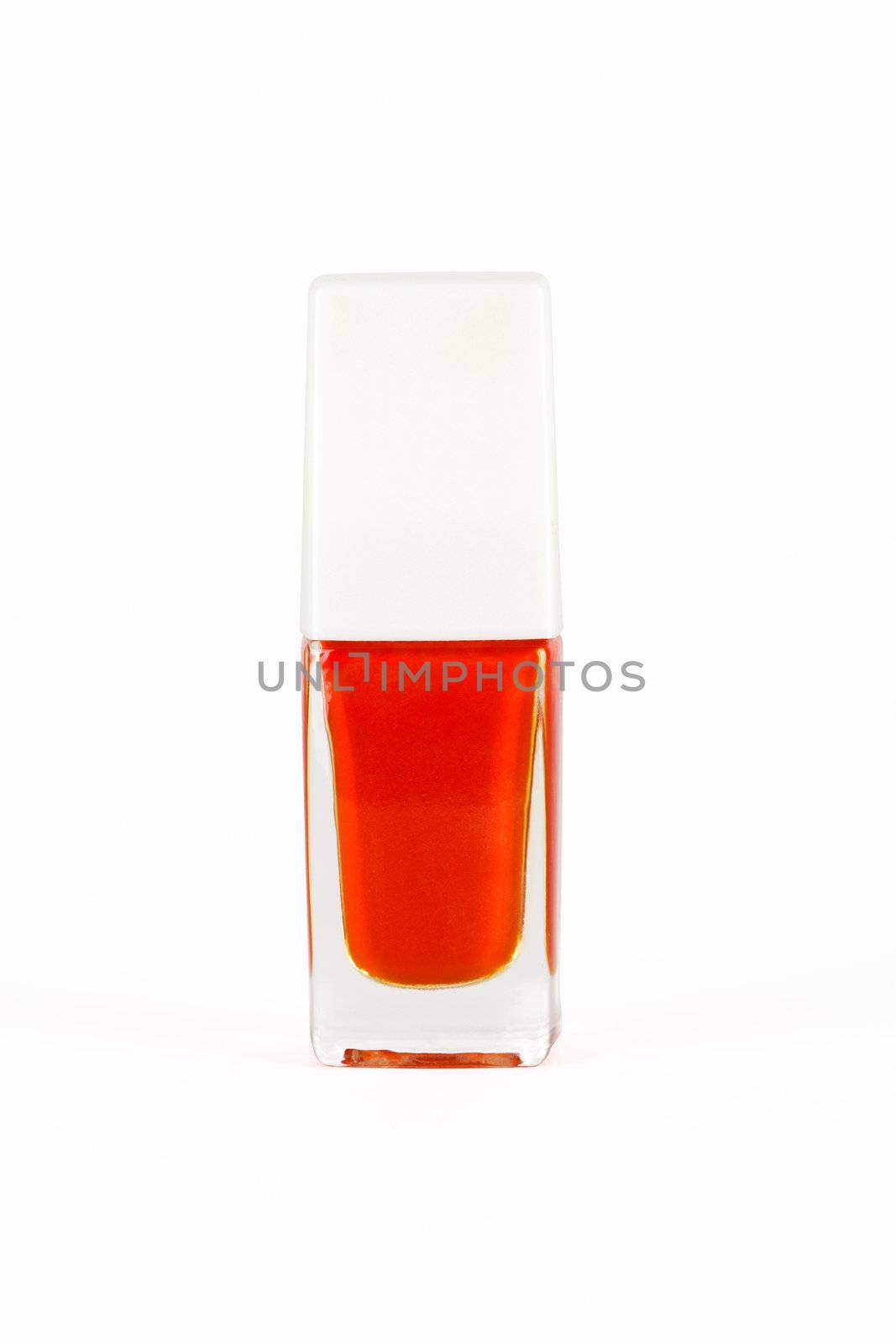red nail polish bottle on white background
