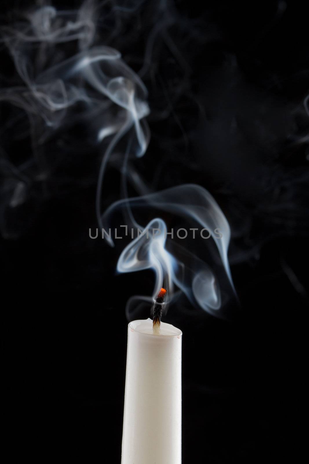 Extinguished candle with smoke (Metaphor of the death)