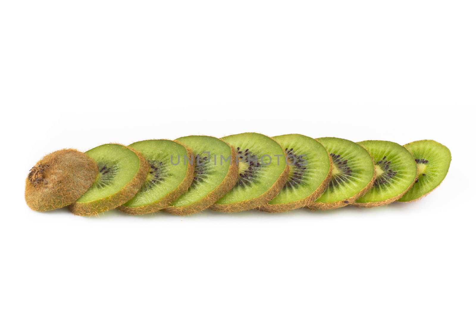 Sliced kiwi fruit on white background