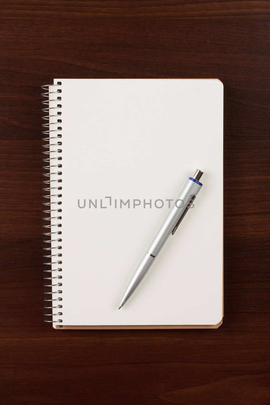 a pen and blank paper
