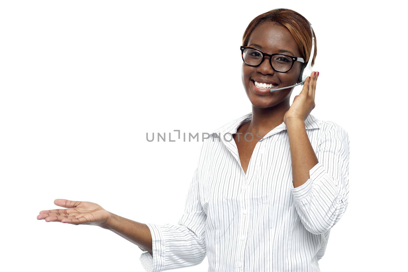 Customer service representative attending calls. Making gestures with hand while explaining it to client