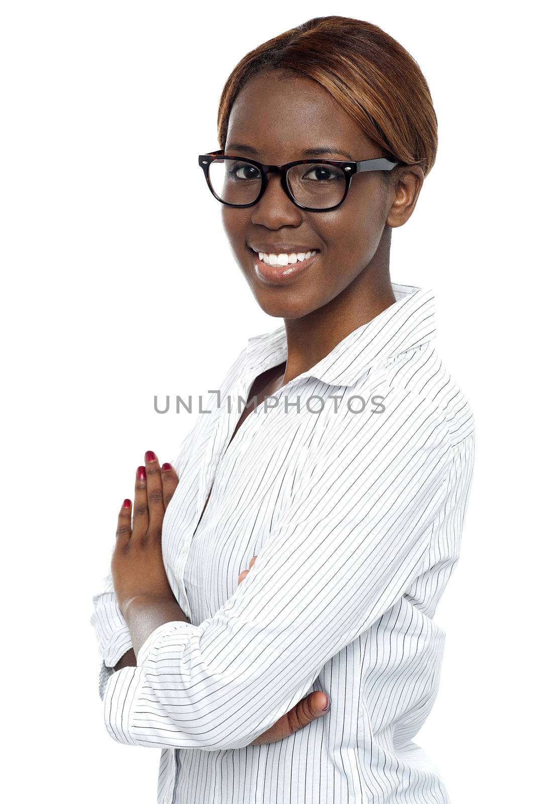 Smiling african lady consultant posing with arms crossed. Closeup shot