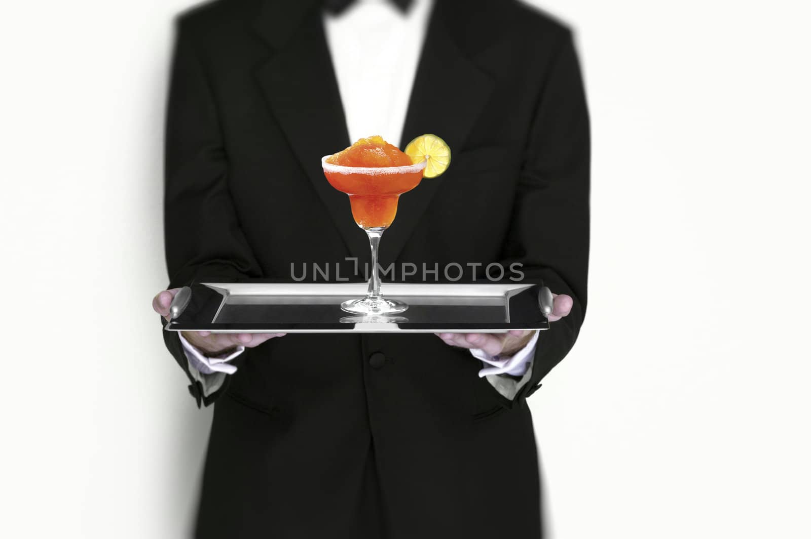 Manhattan Cocktail Being Served by Waiter on Silver Tray isolated
