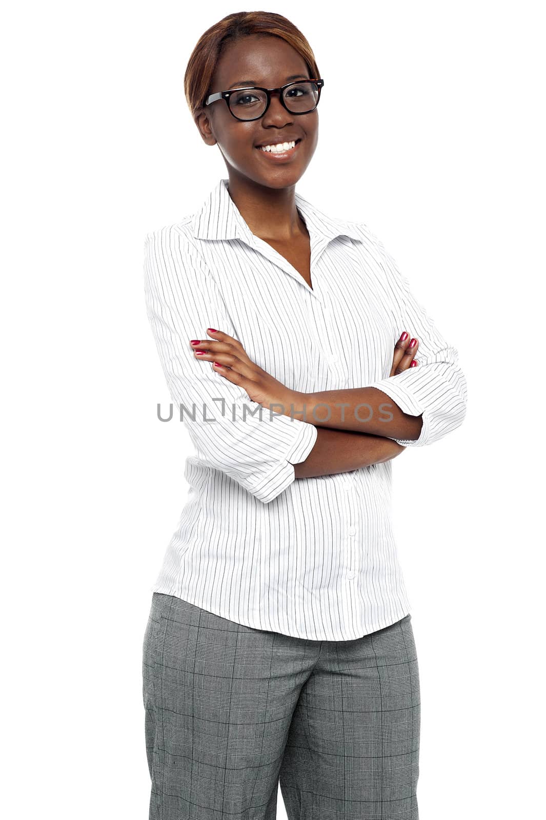 Portrait confident african woman executive posing with arms crossed isolated against white background
