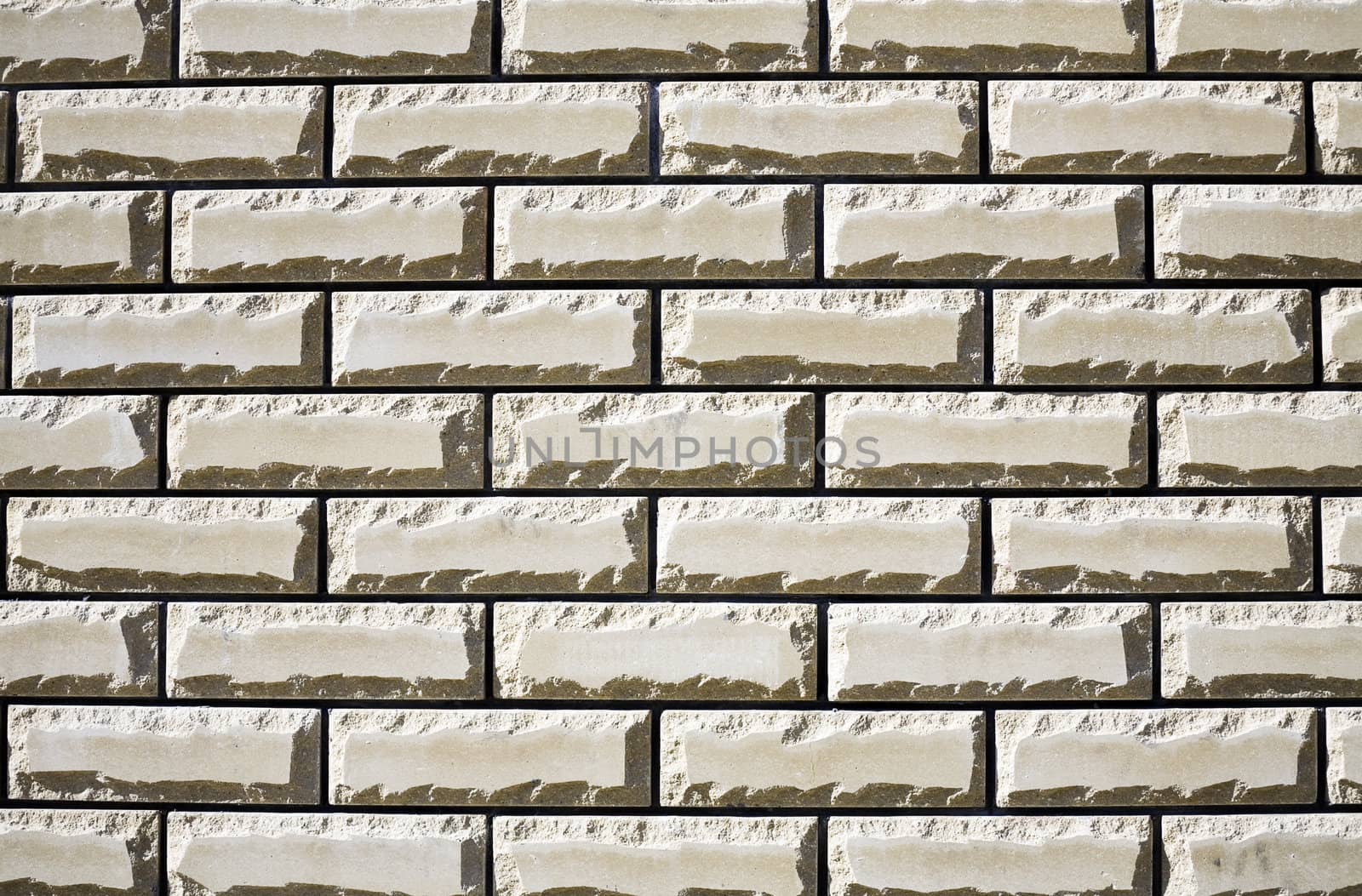 Wall from a white brick as a building or construction background