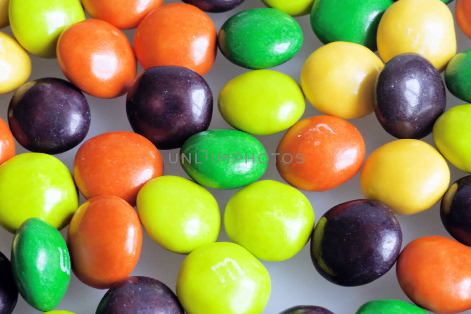 Multi-colored sweets as a celebratory background