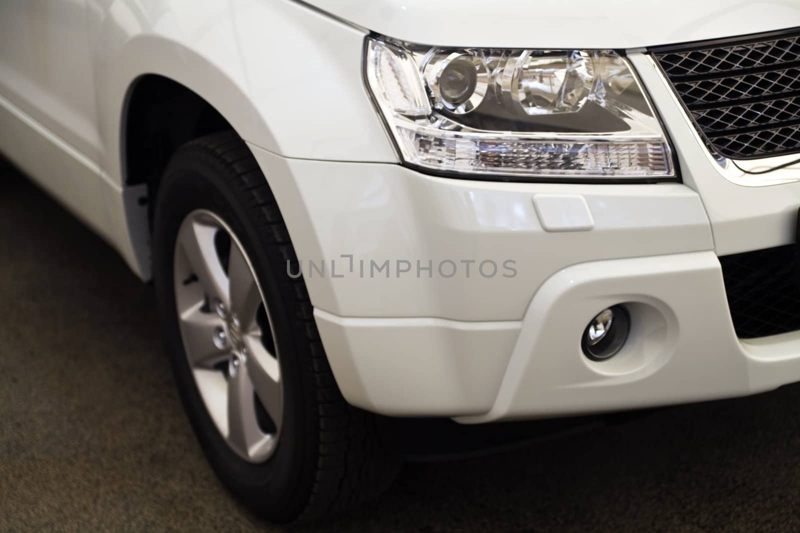 Headlights of the modern white car