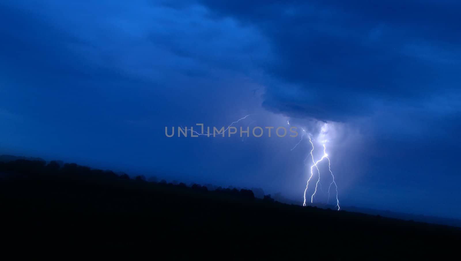 Great lightning in blue sky by kvinoz
