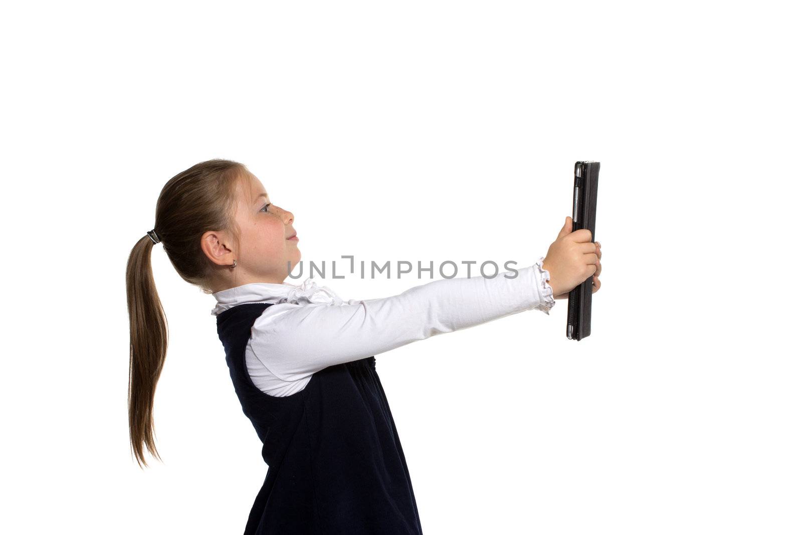 The little girl with the tablet on a white background