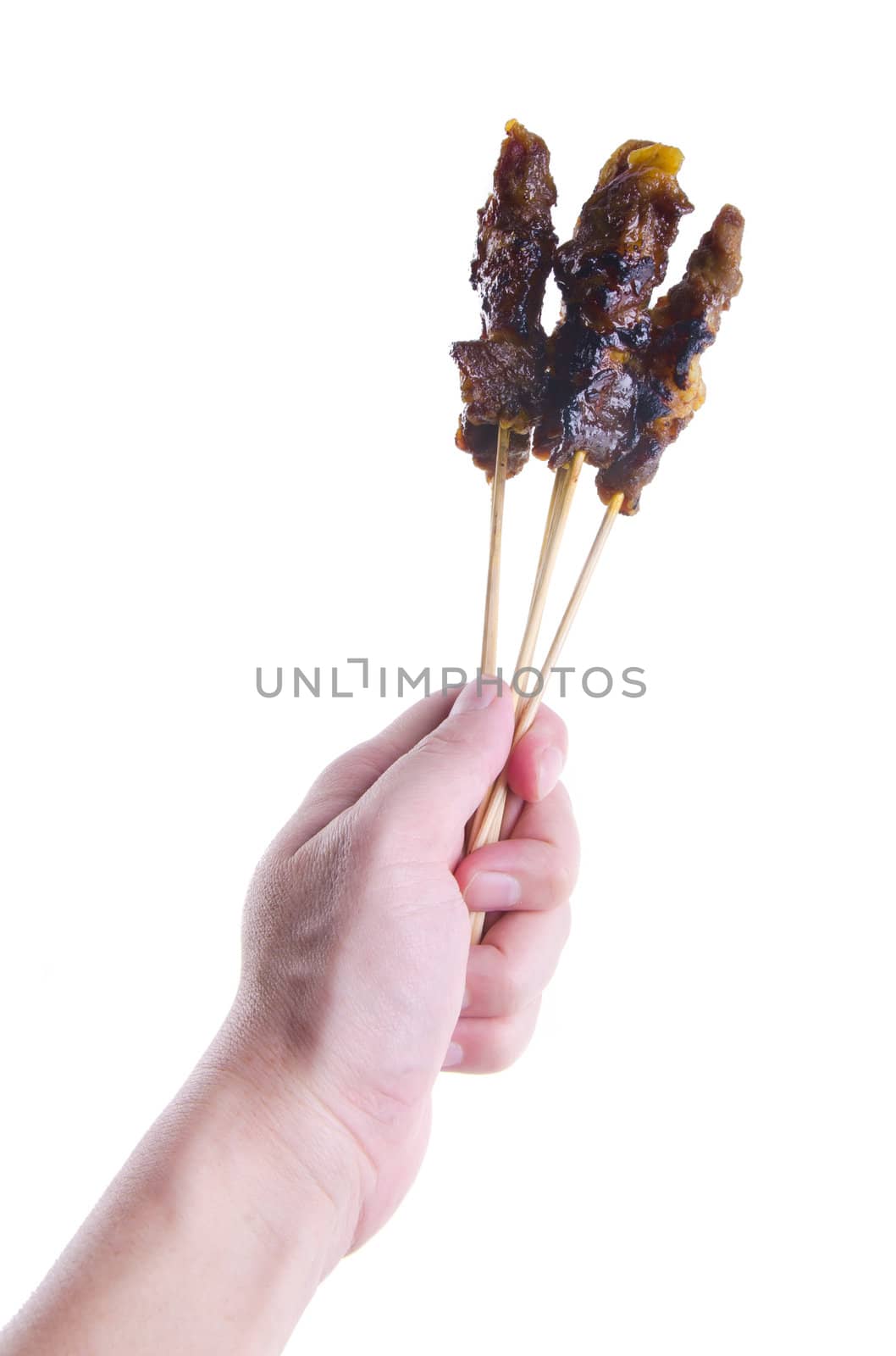 Satay. Hand Holding Sticks Of Barbecue Satay