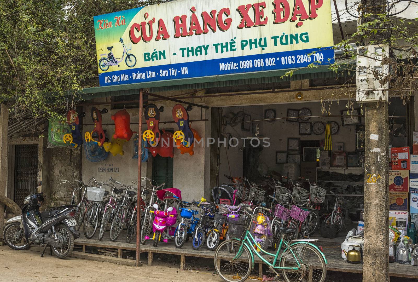 Vietnam Duong Lam - March 2012: Bike shop in rural village. by Claudine