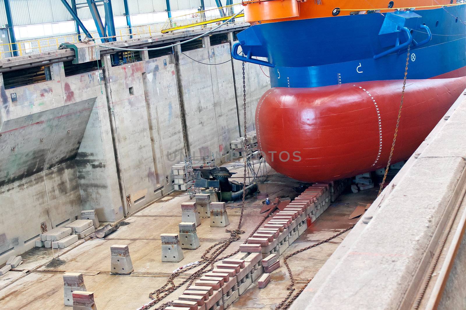 Ship in  shipyard's covered dry dock 