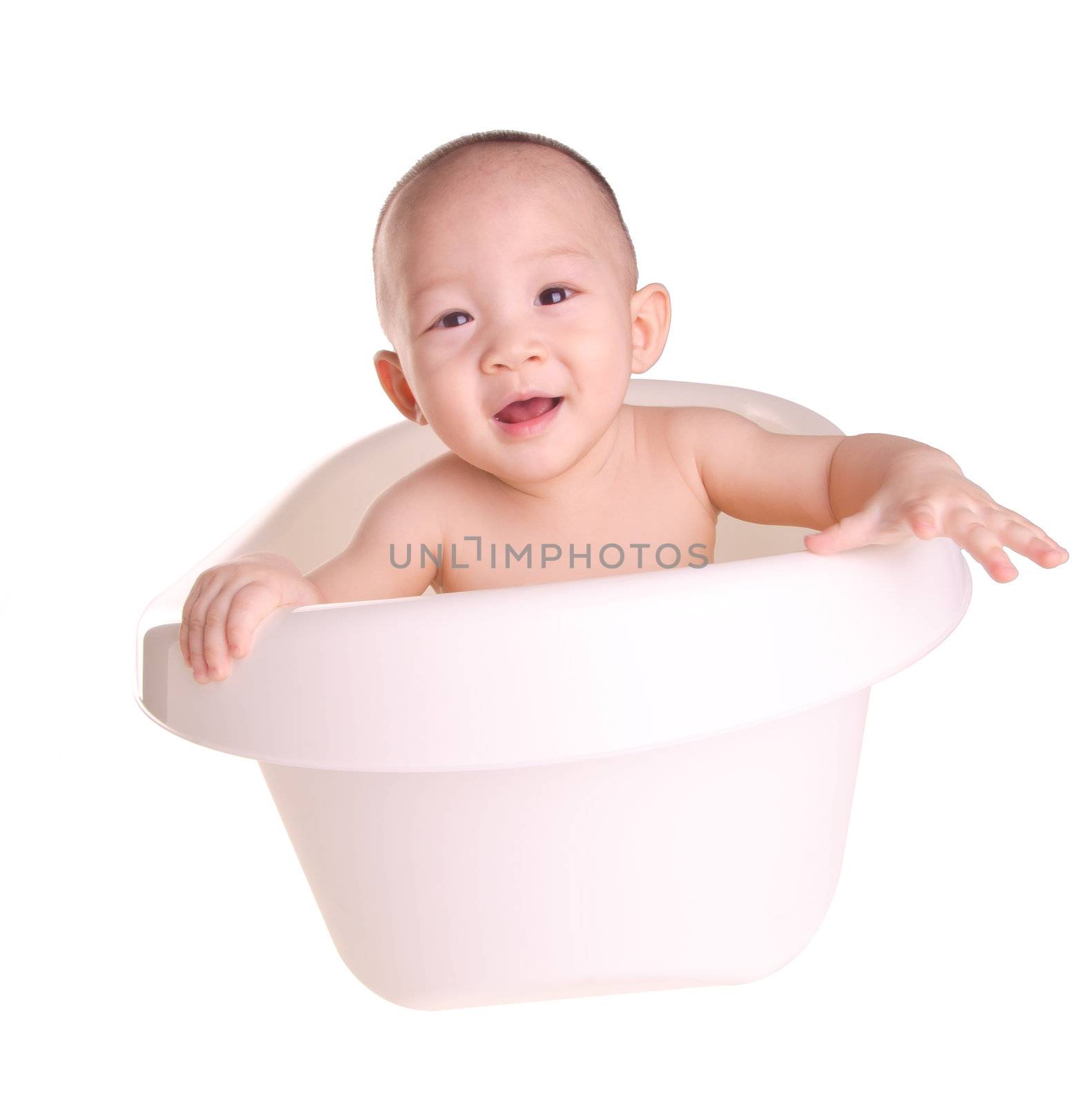 baby boy, asian Cute baby having bath in tub by heinteh