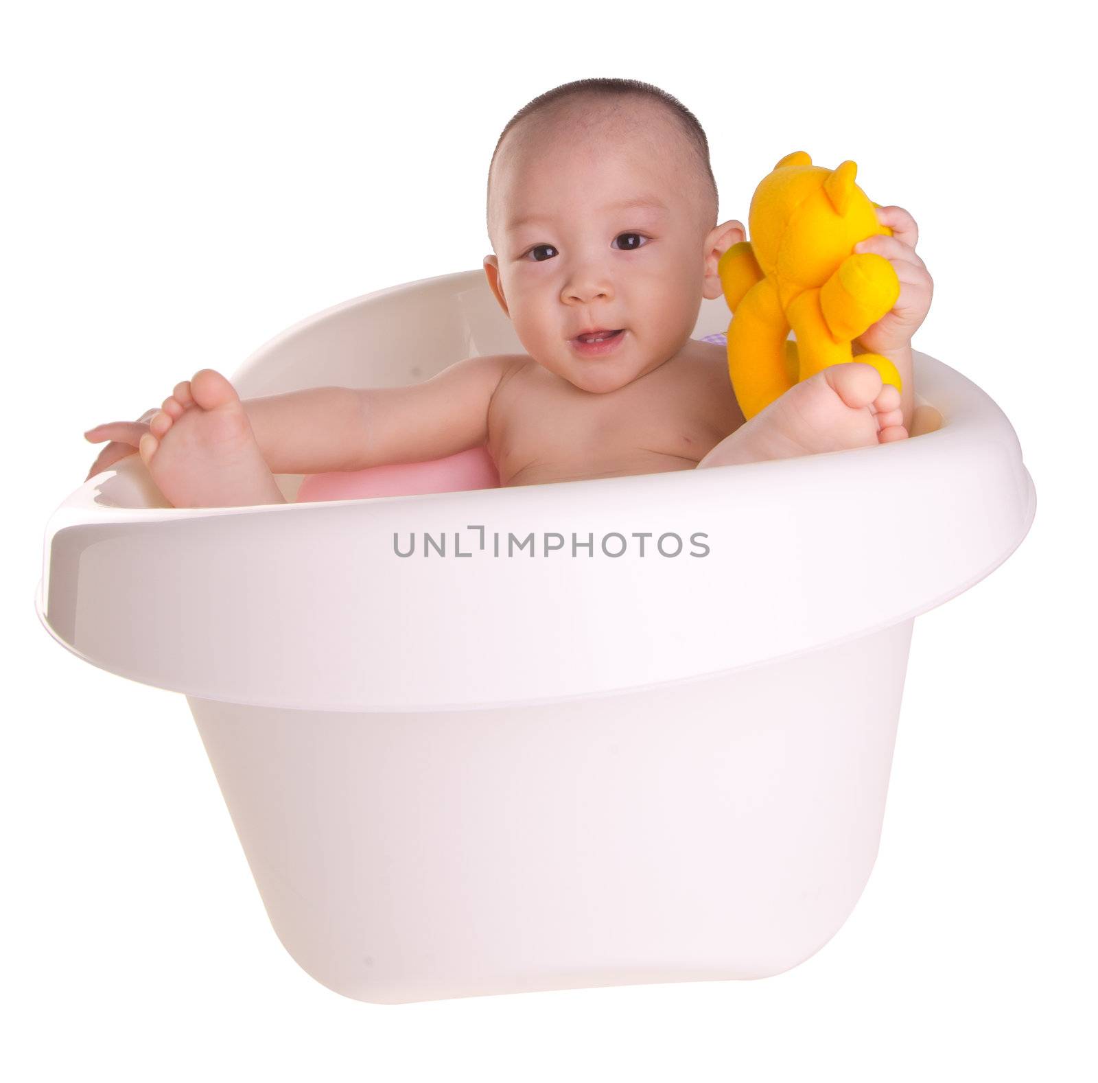 baby boy, asian Cute baby having bath in tub by heinteh