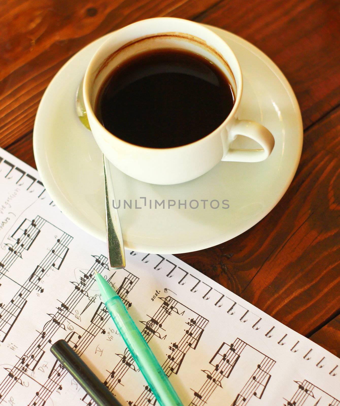 Hot coffee on music note with pen by nuchylee