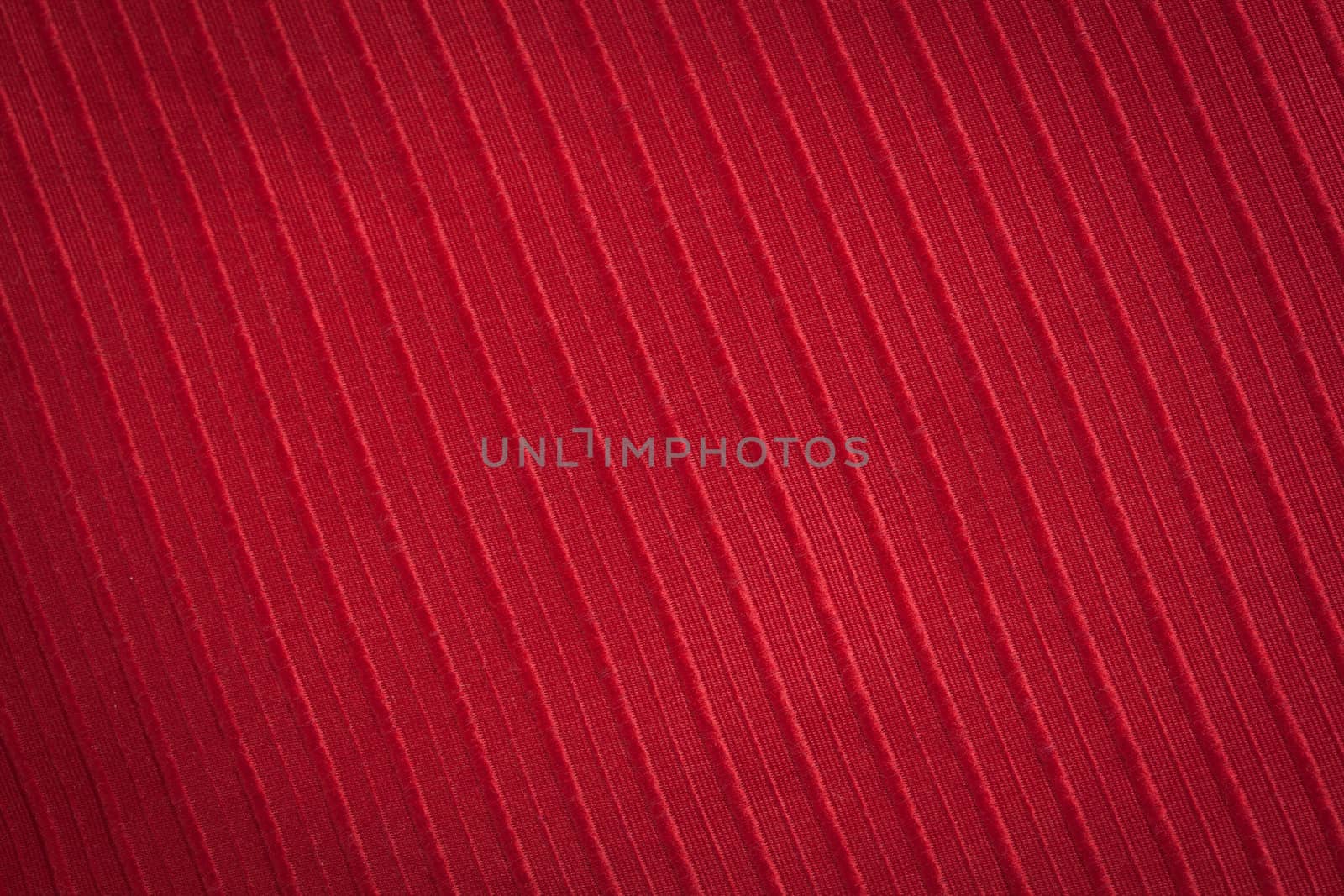 Red striped texture and background close-up