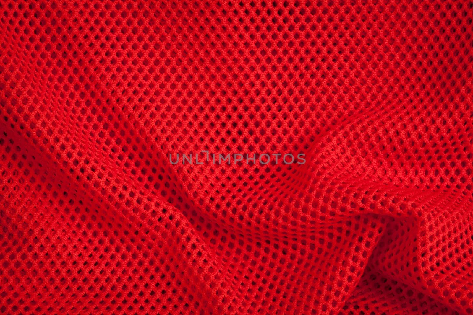 Red fishnet texture and background close-up