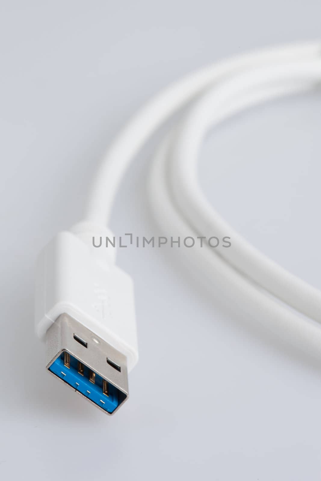 White USB Cable by Izaphoto