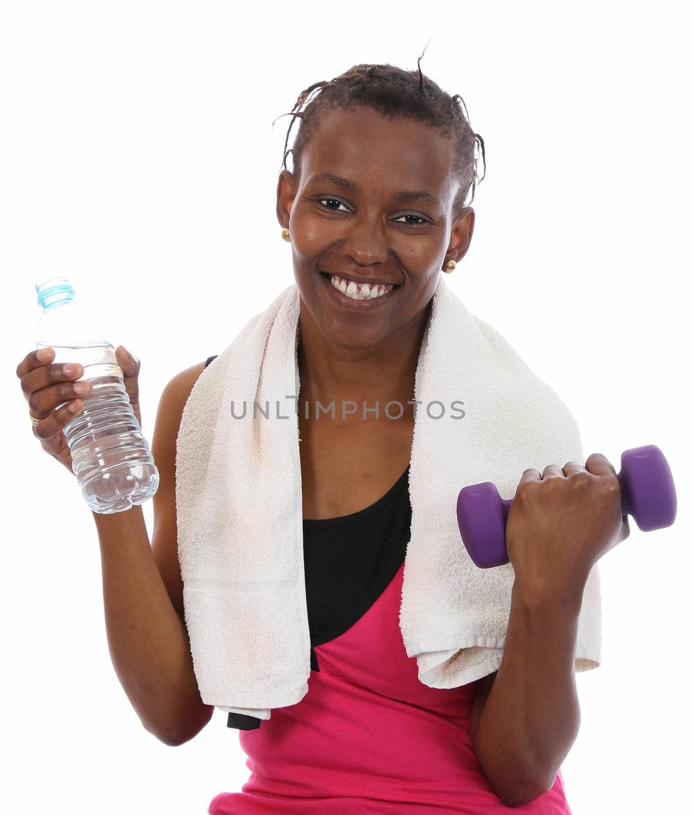 Young African woman drinking water after hard exercise session