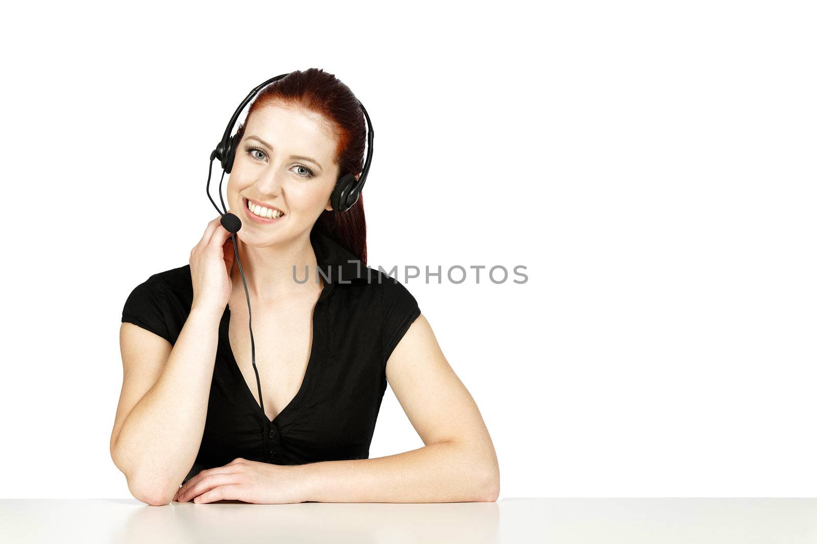 Professional woman talking on a headset in her office at work. With white background