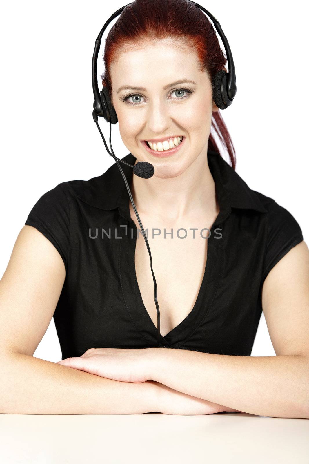 Professional woman talking on a headset in her office at work. With white background