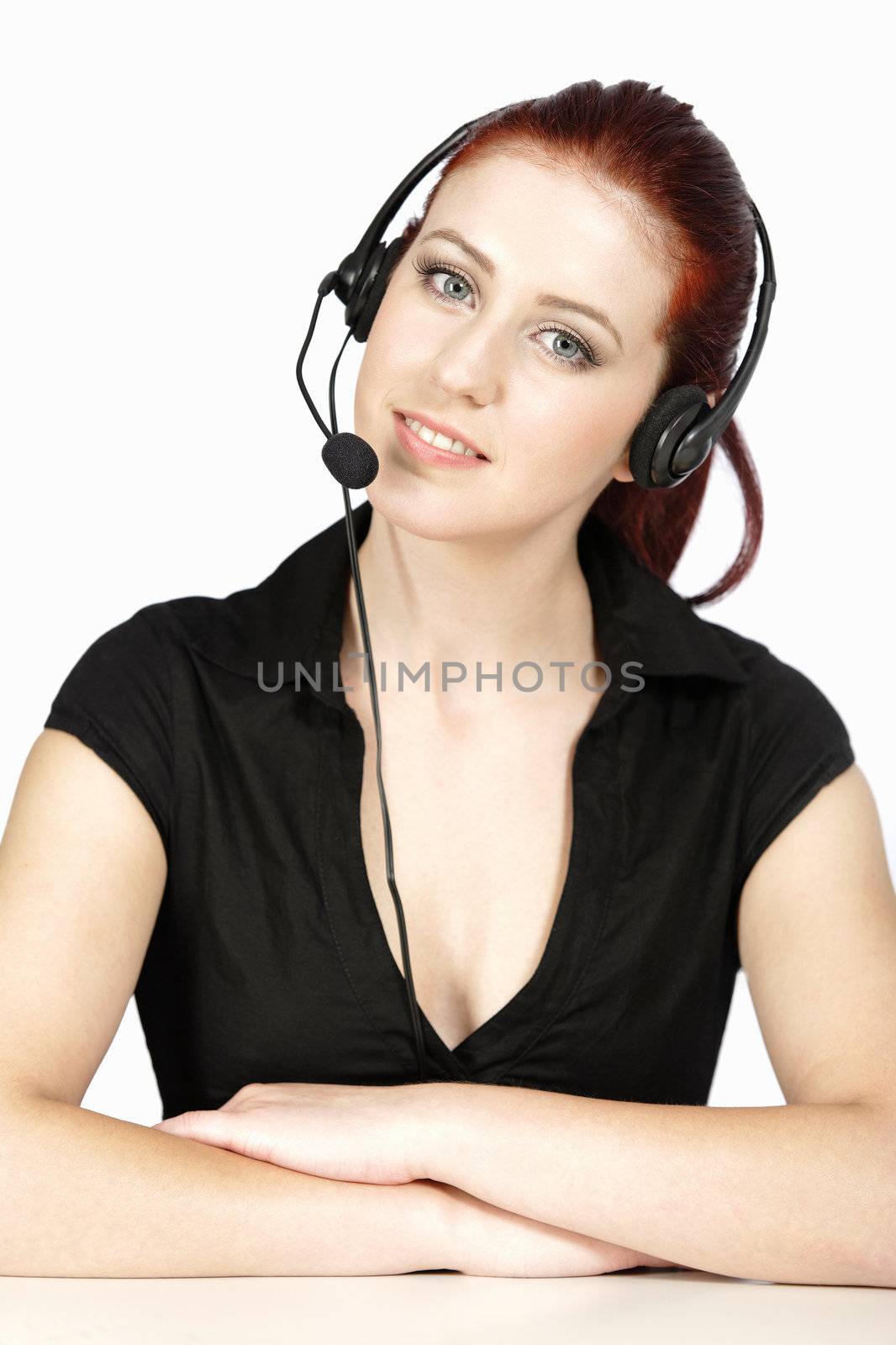 Professional woman talking on a headset in her office at work. With white background
