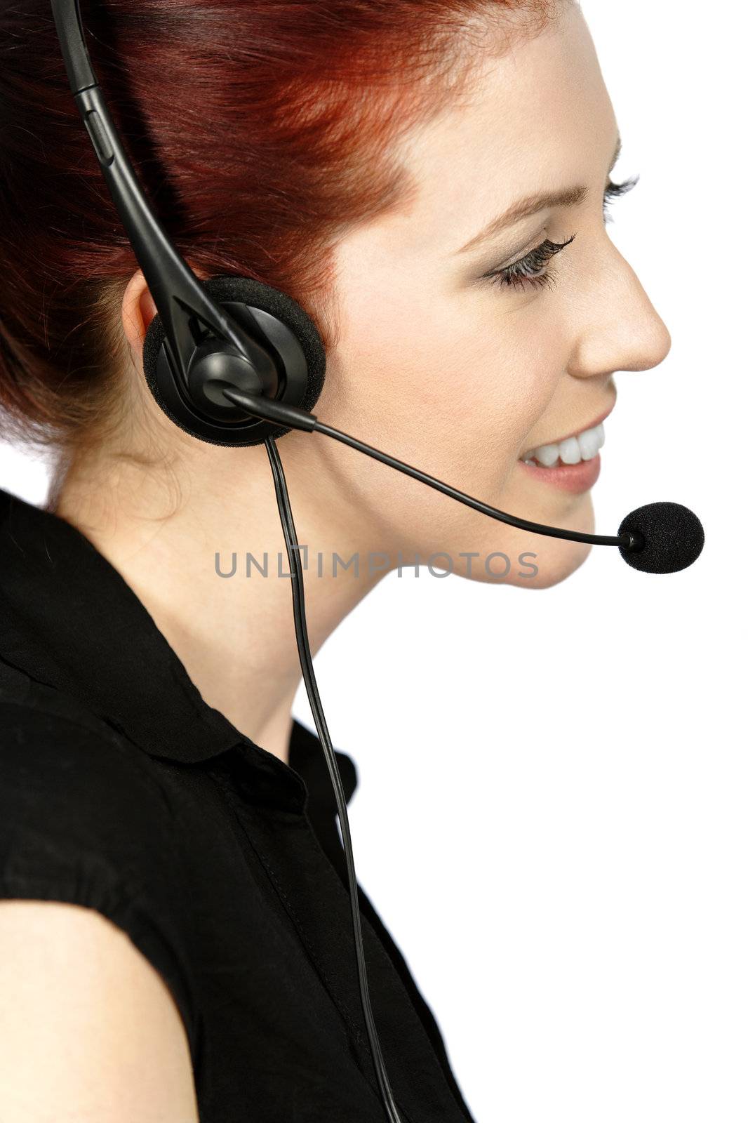 Professional woman talking on a headset in her office at work. With white background