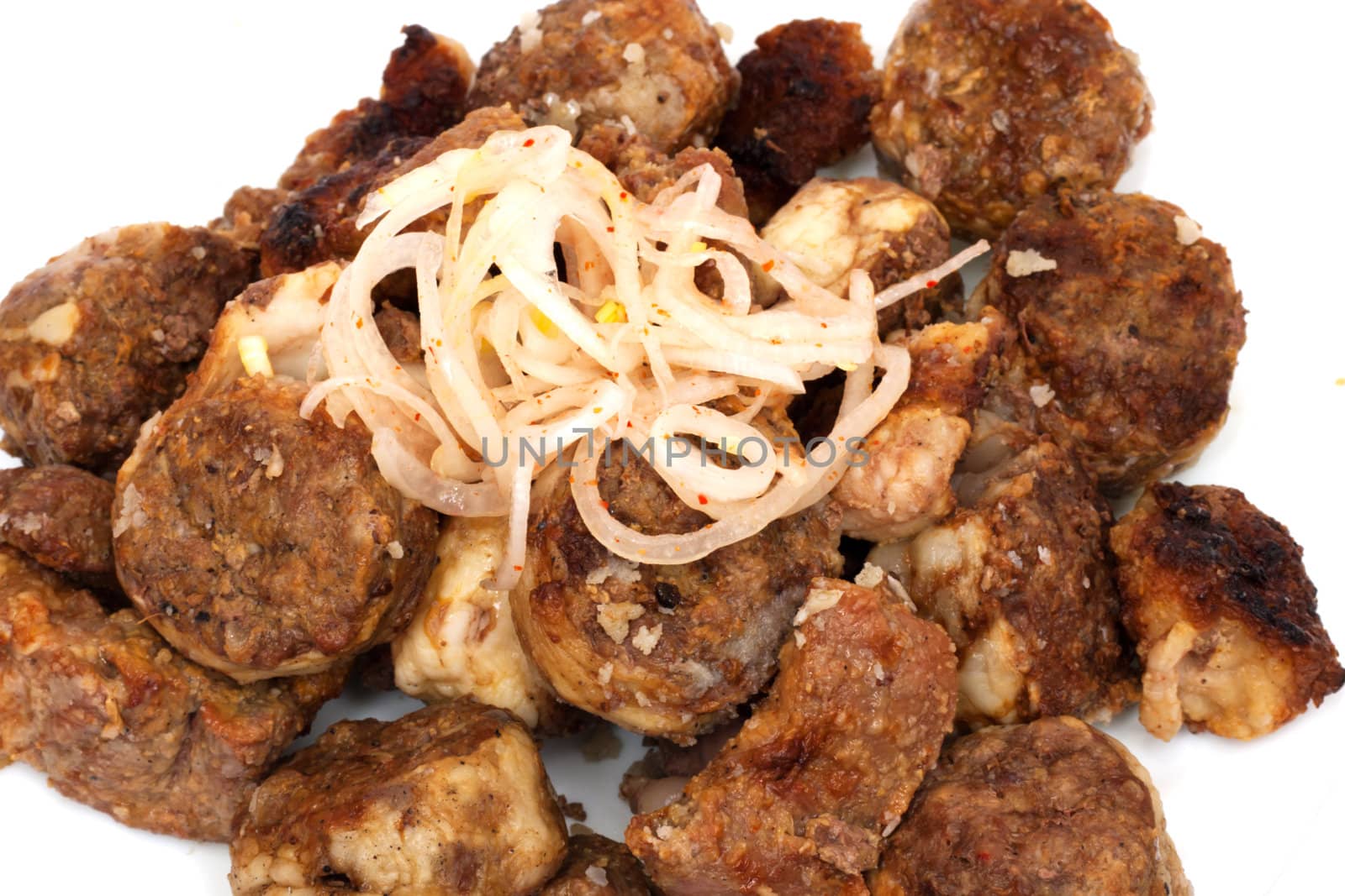Pork kebab on white