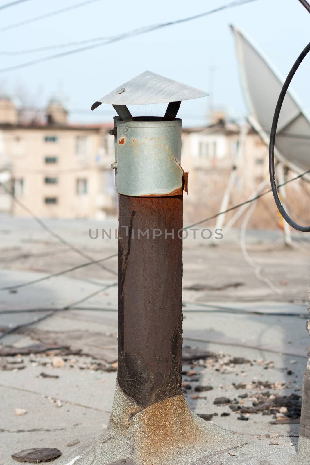 Pipe on a roof by schankz