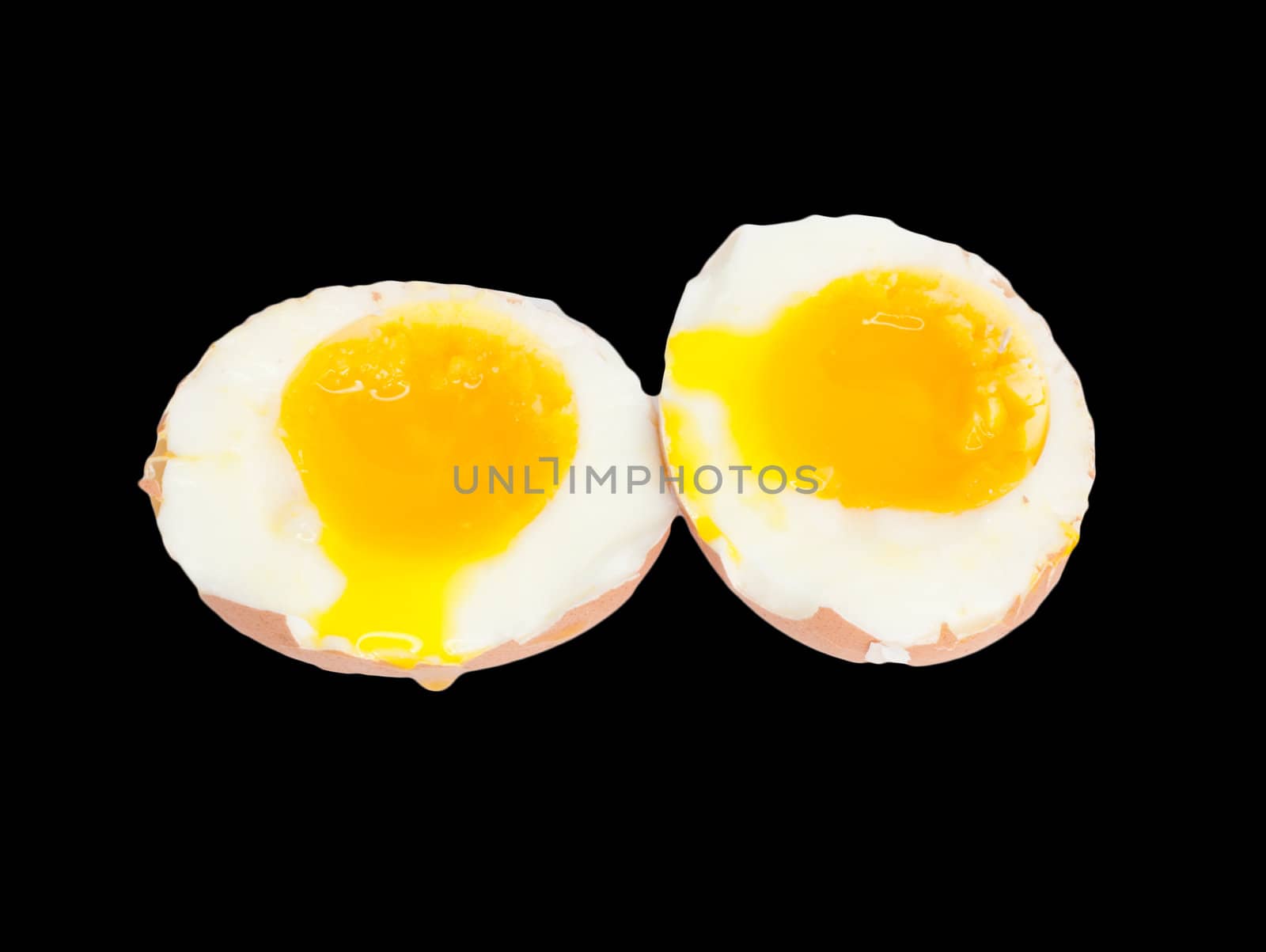 soft-boiled egg on a black background