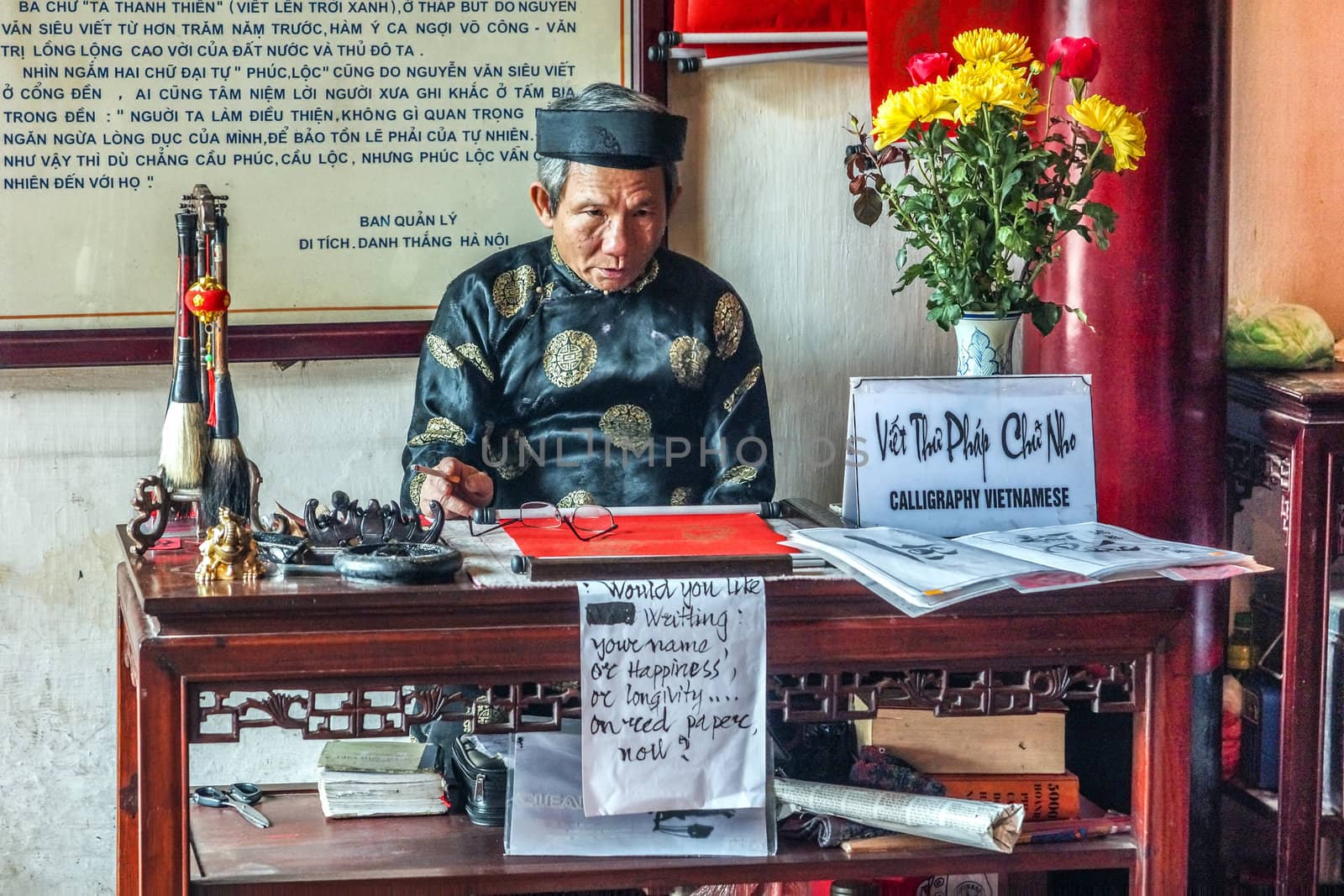 Vietnam Hanoi. Staring as if he was a puppet but the cigarette gave him away.