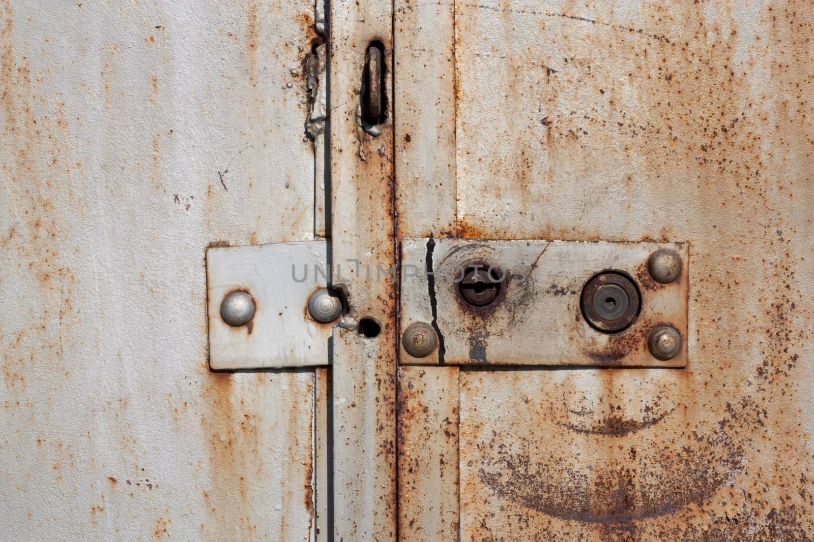 Old padlock on garage collars 