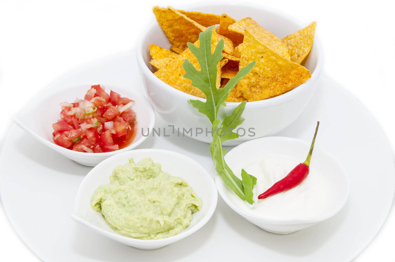 Mexican food dishes at the restaurant on a white background