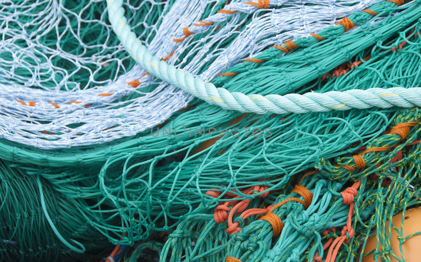 Closeup of Green Blue and Orange Fishing Net