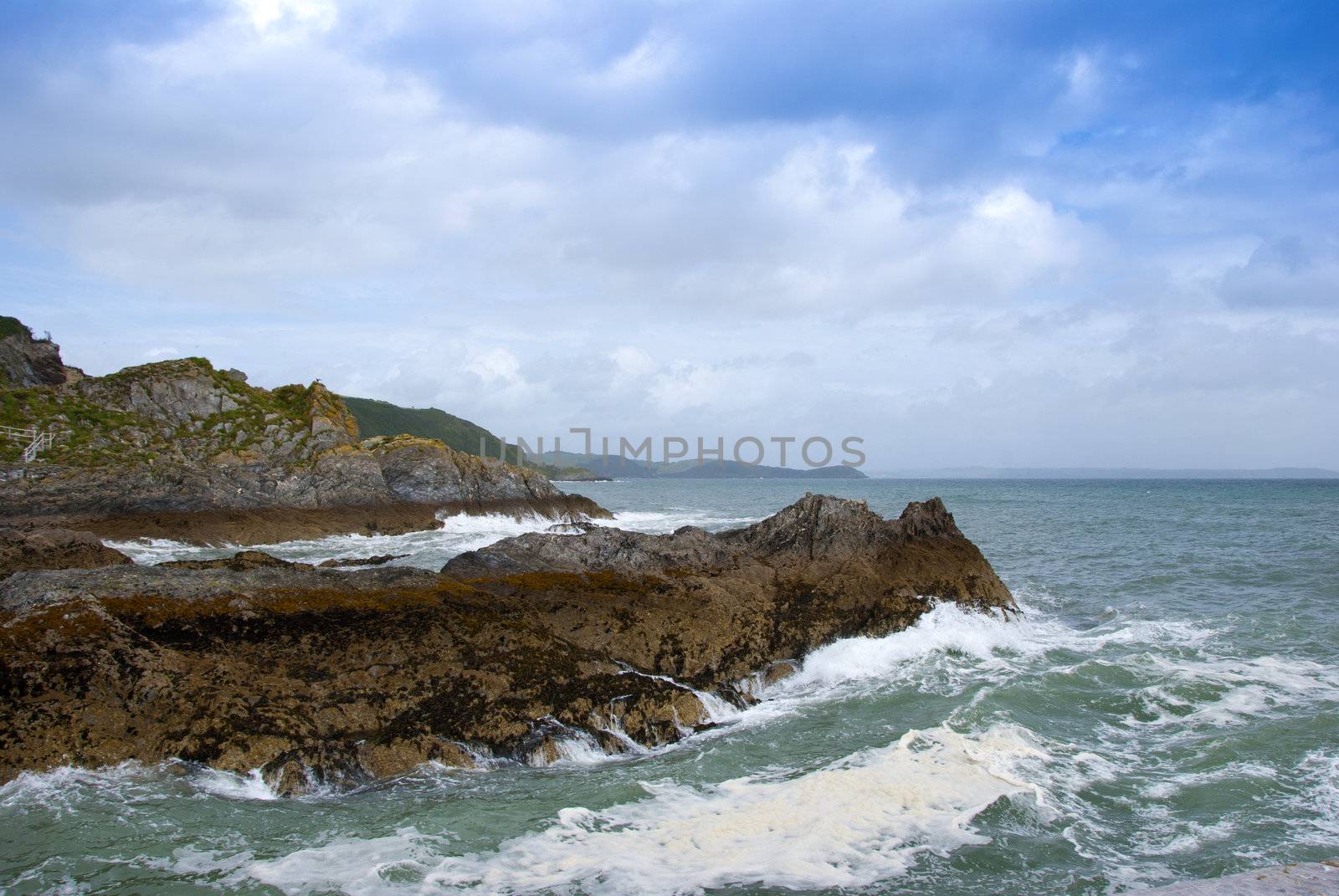 Waves Breaking on a rocky headland in Cornwall England