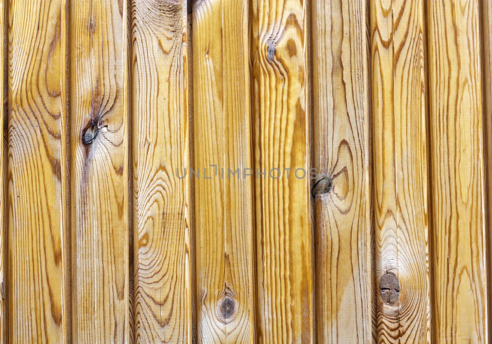 Close up of gray wooden fence panels  by schankz