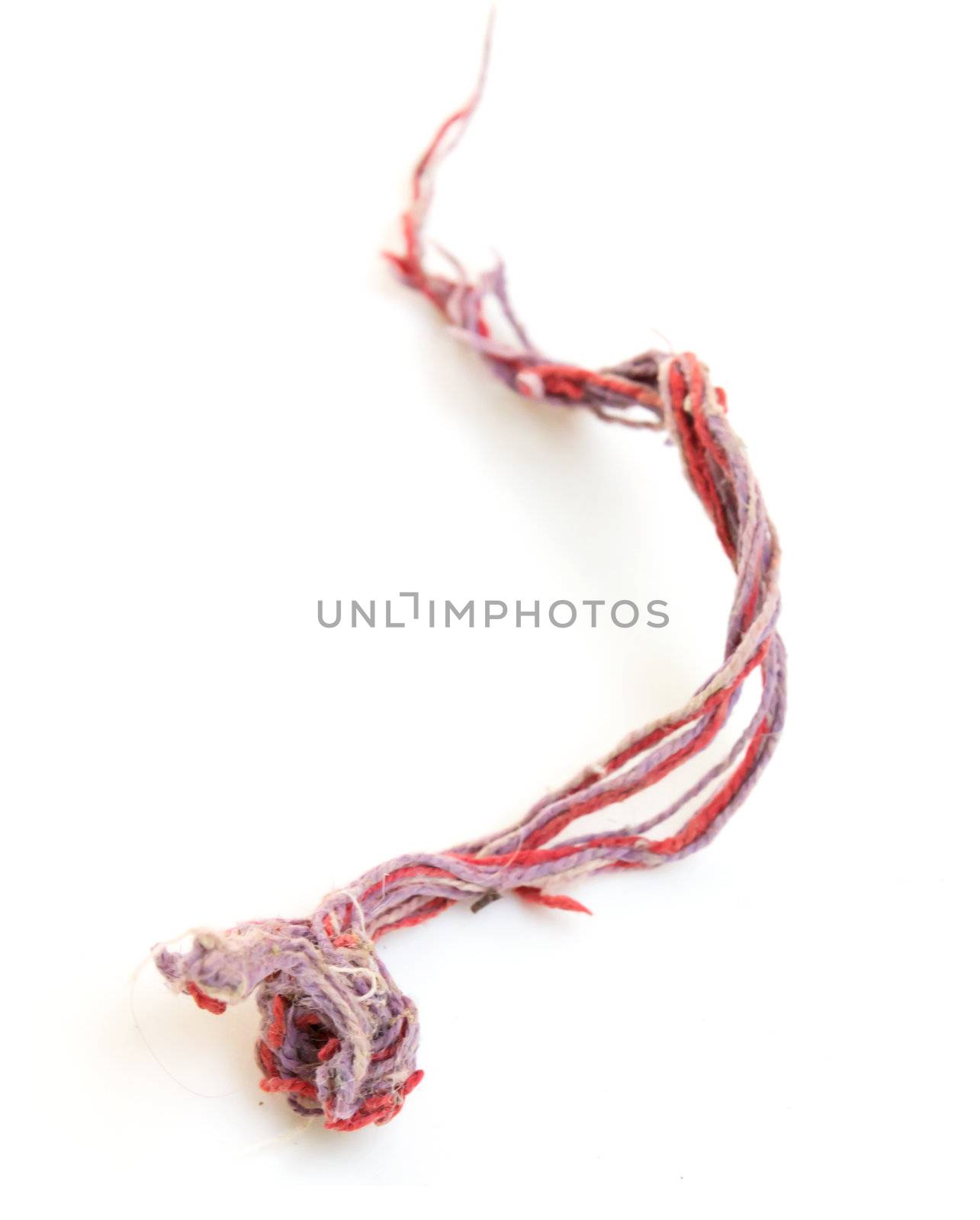 multi-colored rope on a white background by schankz