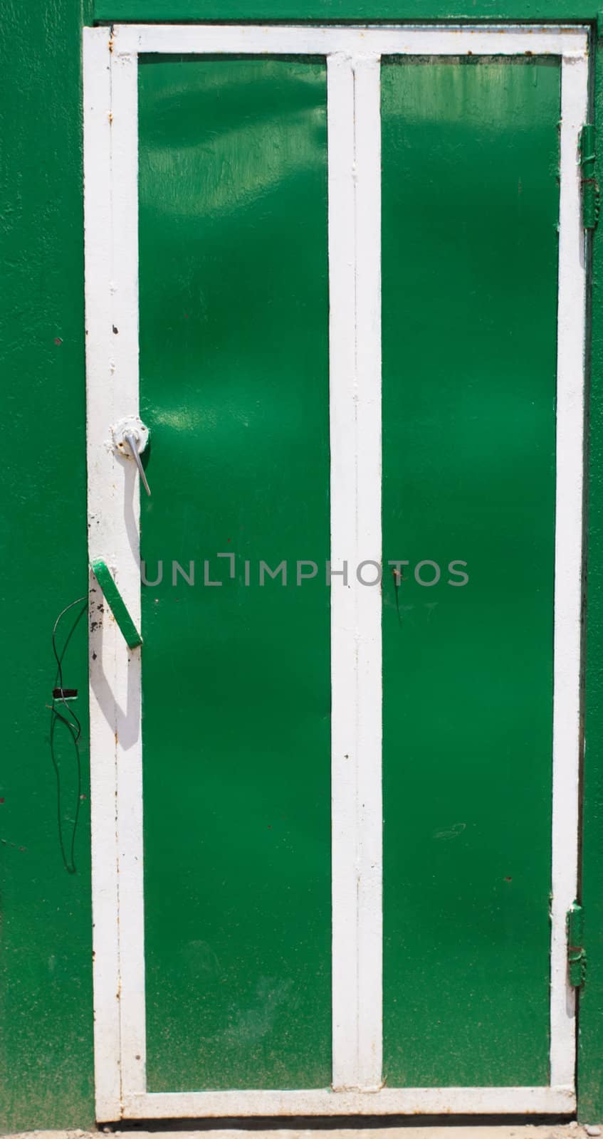 green metal door by schankz
