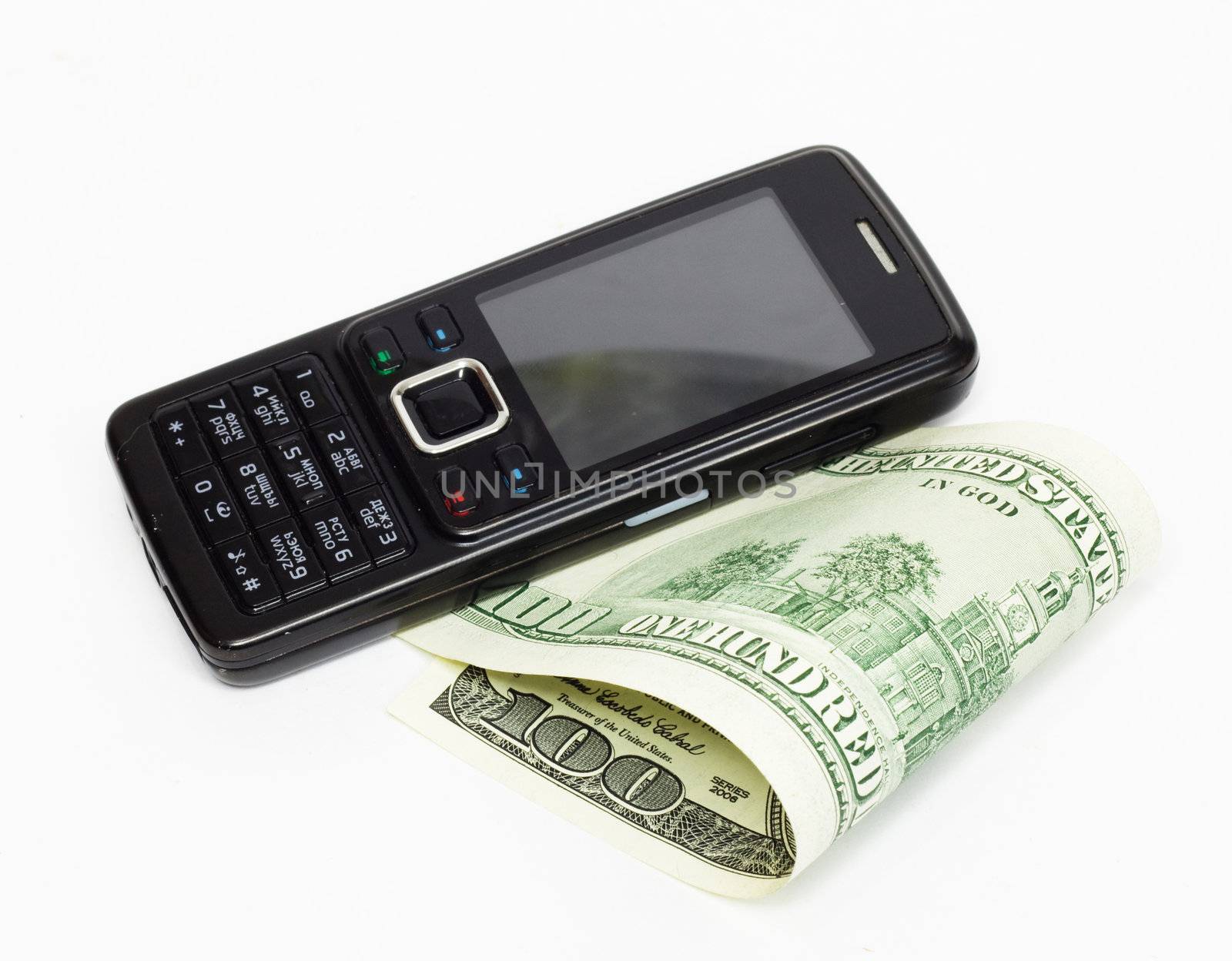 Mobile phone and dollar bank notes by schankz