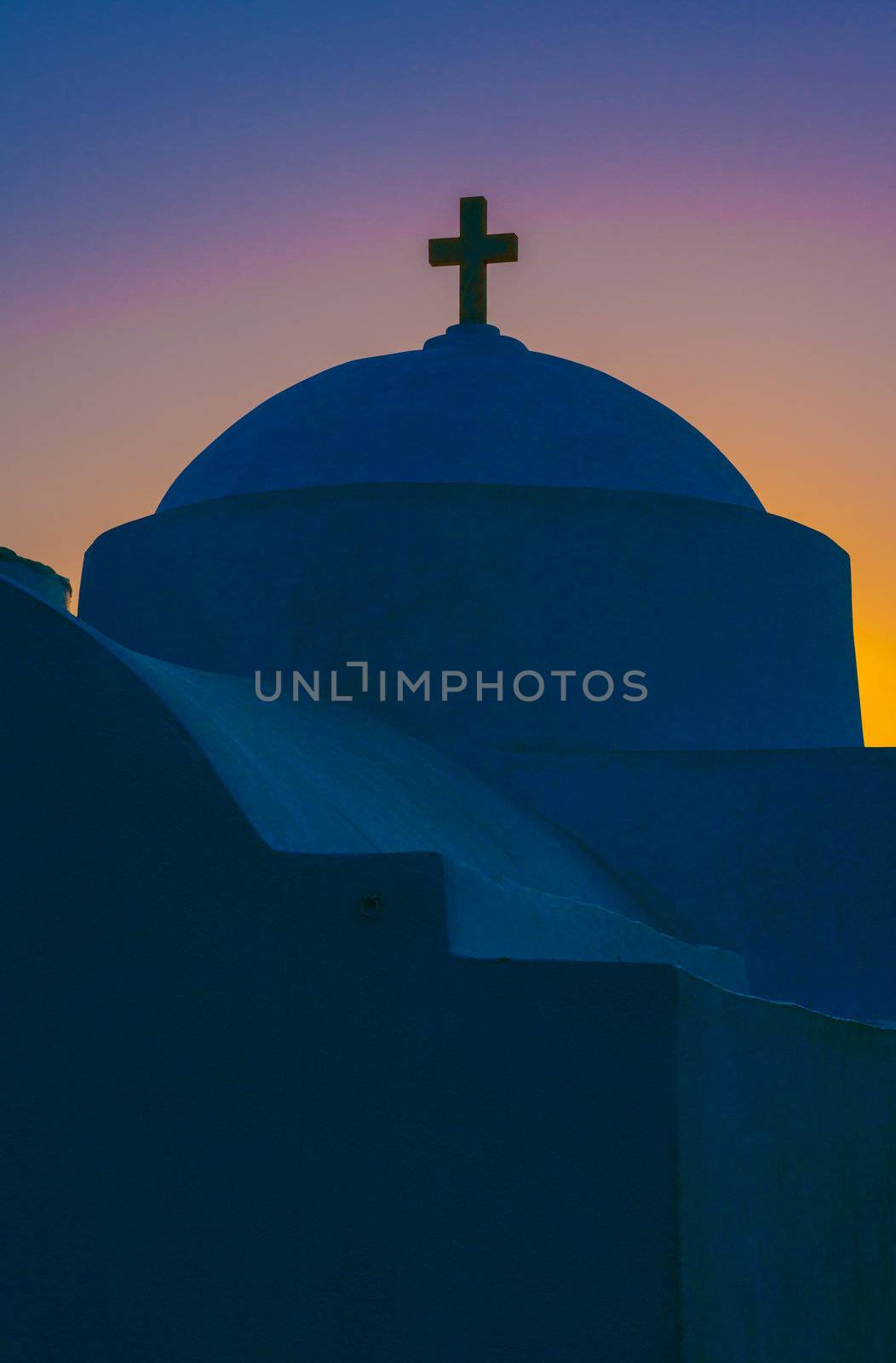 Greek chapel from Cycladic island just before sunrise, with amazing sky colors