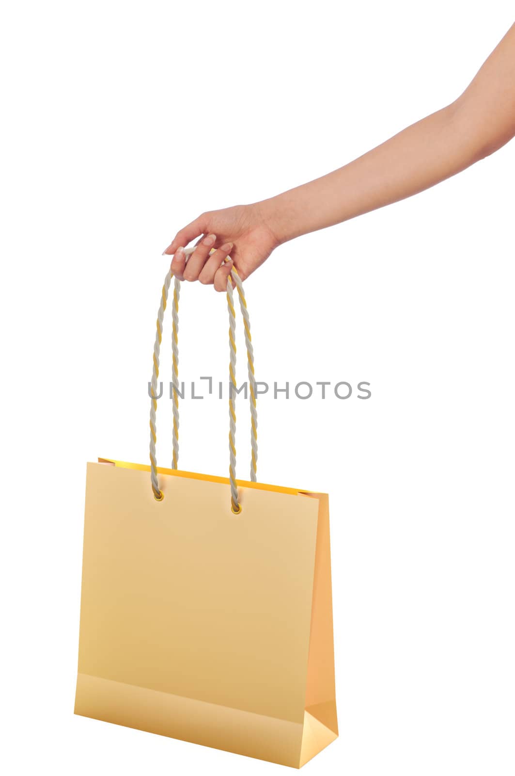 Paper shopping bags from the supermarket in the hand