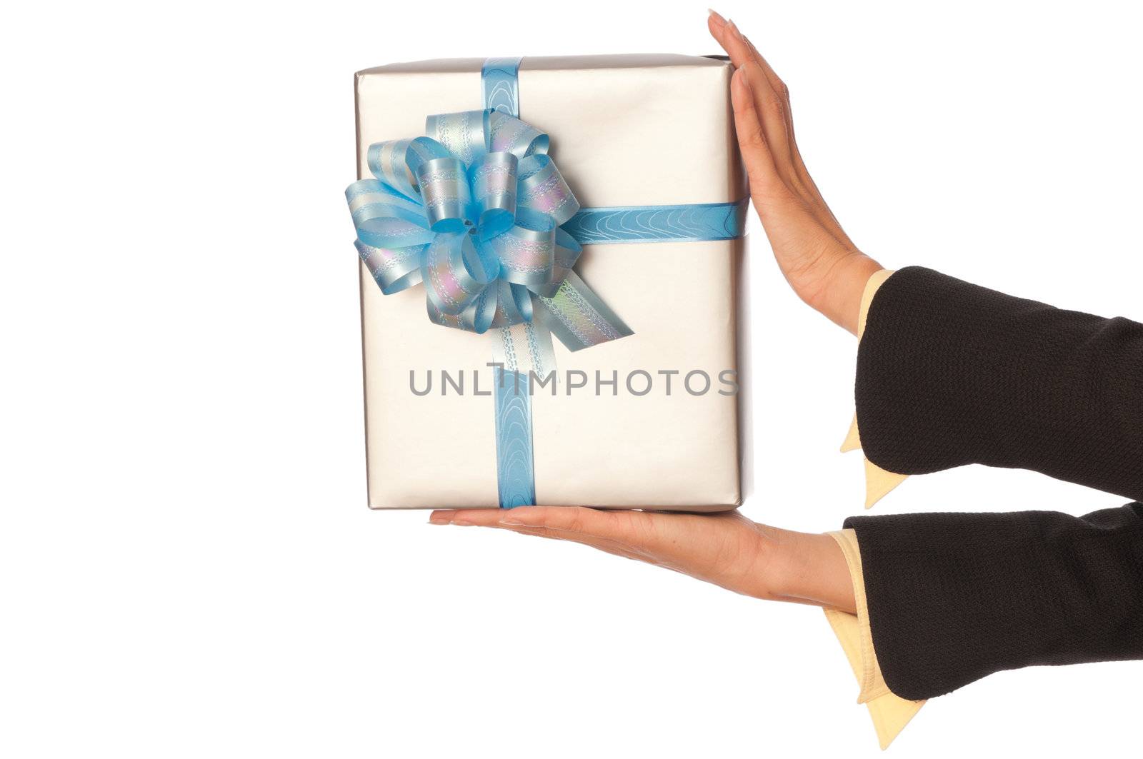 woman giving a silver box with blue bow as a gift for birthday