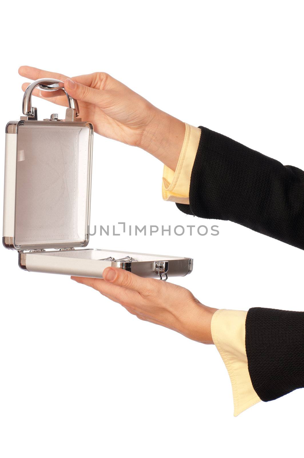 woman unlocking metal grey case with cosmetics