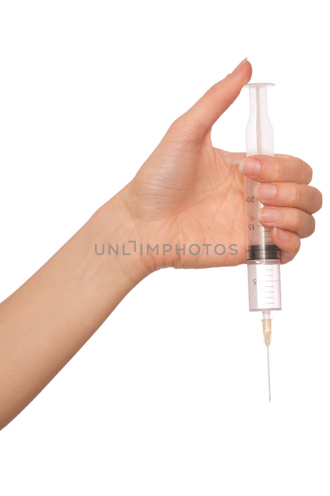 syringe in the woman's hand for making injections