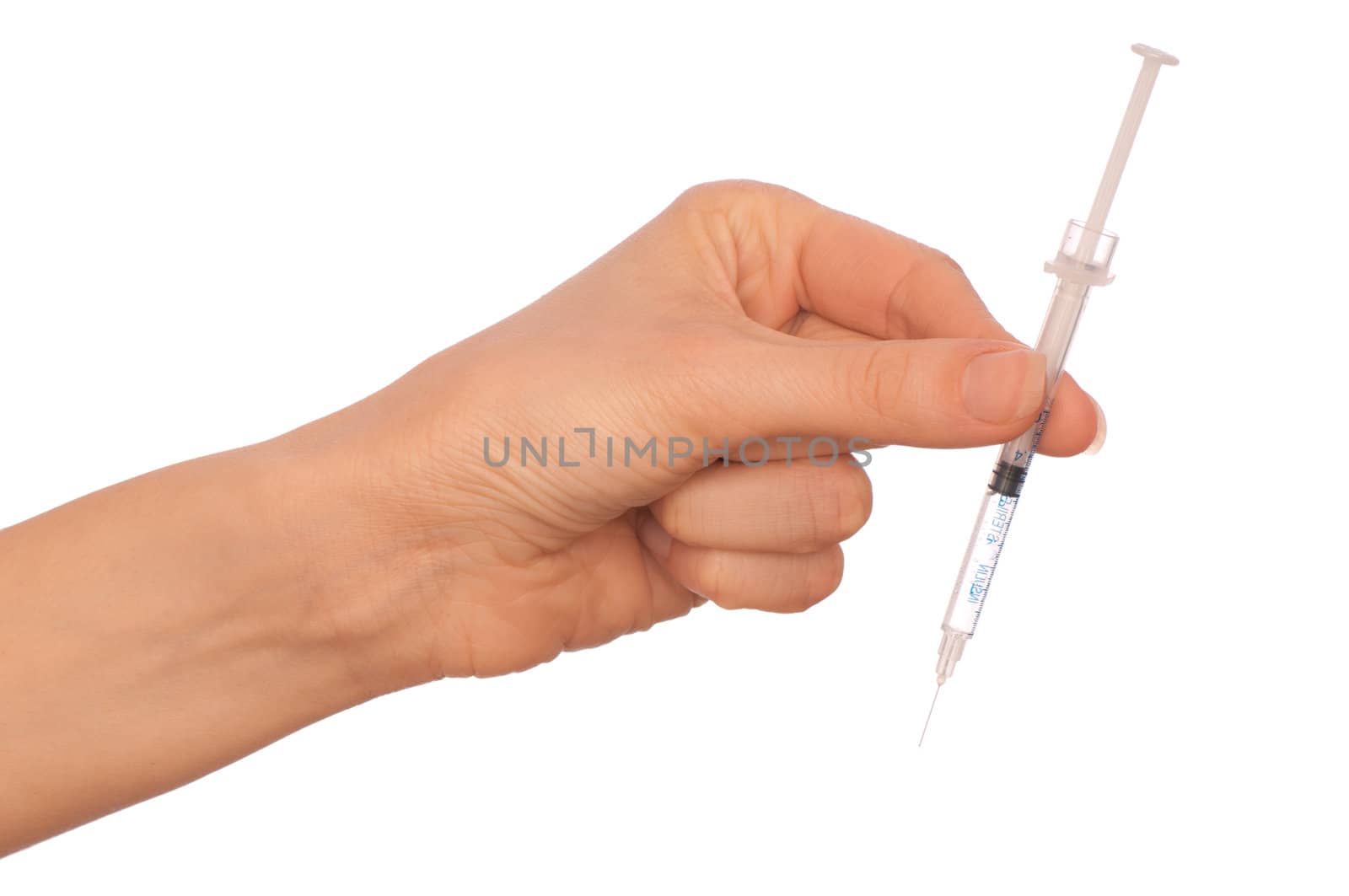 syringe in the woman's hand for making insulin injections