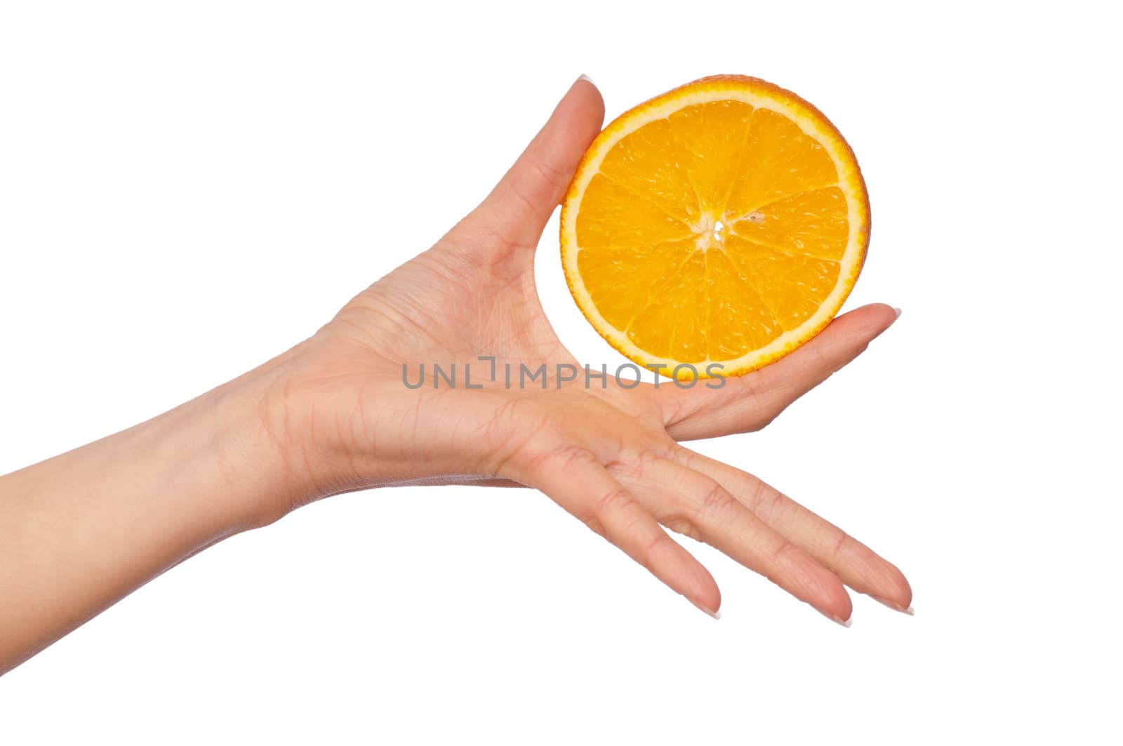 Slice of a fresh Sicilian orange in the hand